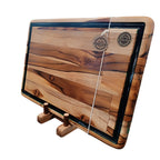 Tábua de churrasco Texas, perfil lateral, canaleta resina preta, pés de silicone, Teca, Ponciano.